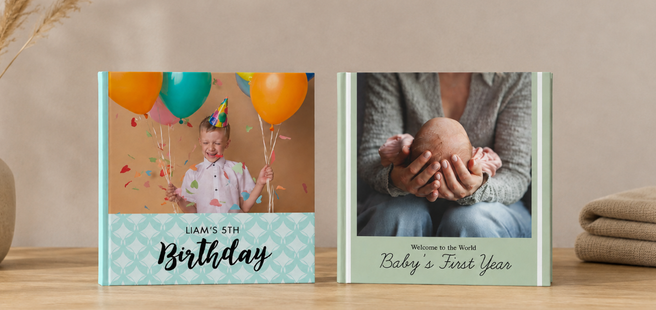 Closed photobook showing photos of a son and father on the cover that reads 'my dad is my superhero'.