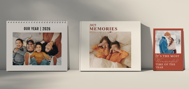 Closed photobook showing photos of a son and father on the cover that reads 'my dad is my superhero'.