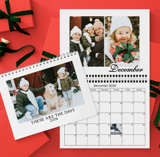 Closed calendar leaned against the wall showing photo of mom and daughter that reads 'Ava & Mom 2024'.