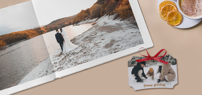 Closed photobook showing photos of a son and father on the cover that reads 'my dad is my superhero'.