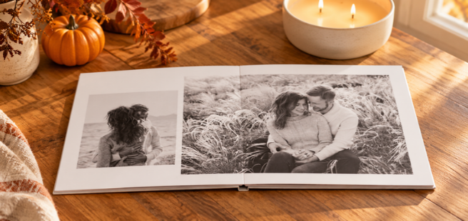 Closed photobook showing photos of a son and father on the cover that reads 'my dad is my superhero'.