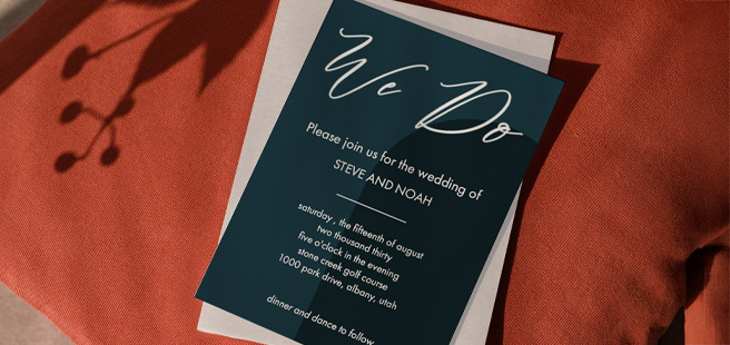 A two tone green Wedding invitation that reads 'We Do' at the top with wedding details below.