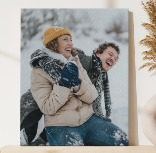 Closed calendar leaned against the wall showing photo of mom and daughter that reads 'Ava & Mom 2024'.