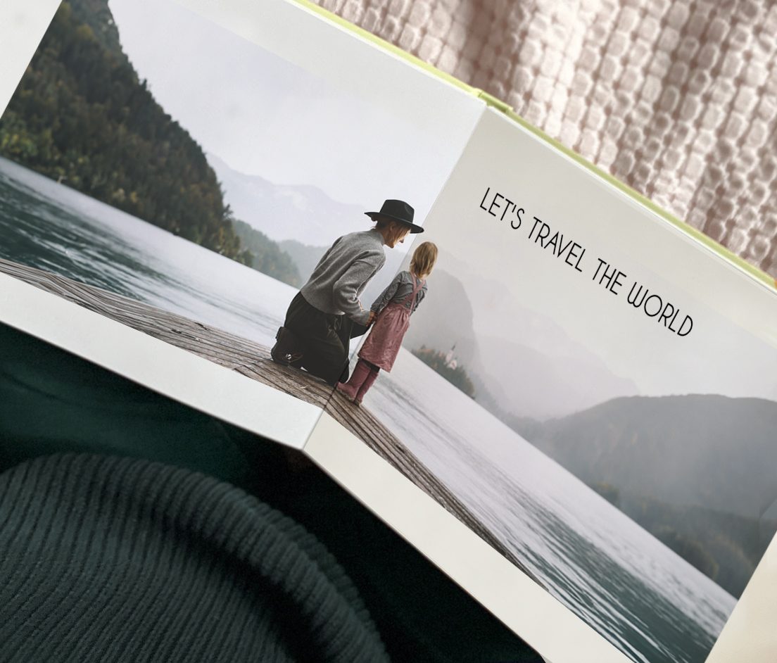 Layflat Photobooks Open layflat photobook with photos of a boho couple for a wedding