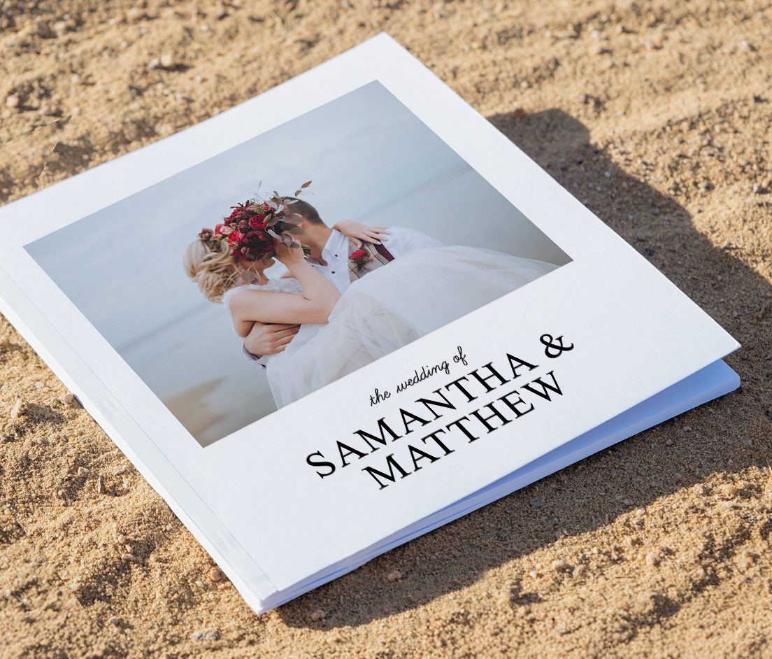 Photobooks Two photobooks stack on top of each other with a photo of a man looking over the ocean on the front with the text Norway 2024'