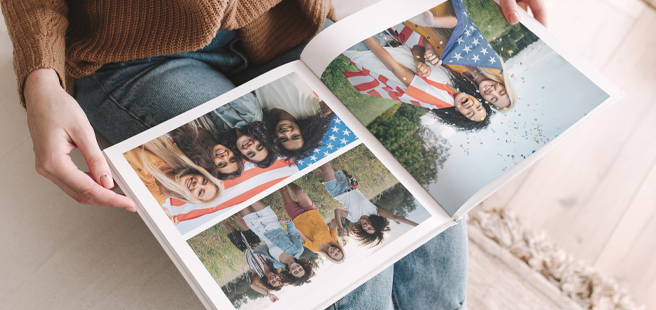 Closed photobook showing photos of a son and father on the cover that reads 'my dad is my superhero'.