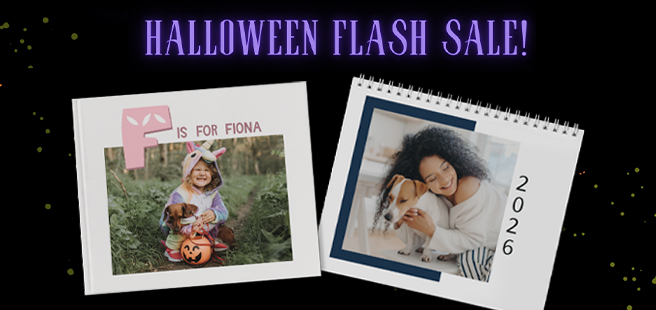 Closed photobook showing photos of a son and father on the cover that reads 'my dad is my superhero'.