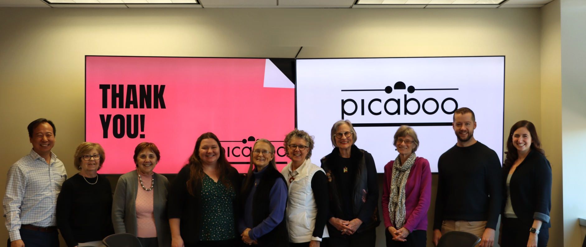 The Picaboo team gathered together, celebrating