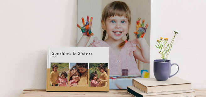 Closed photobook showing photos of a son and father on the cover that reads 'my dad is my superhero'.