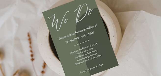 A two tone green Wedding invitation that reads 'We Do' at the top with wedding details below. 