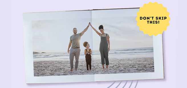 Closed photobook showing photos of a son and father on the cover that reads 'my dad is my superhero'.