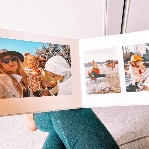 Photobook with a young child on the cover with the text 'Our Little Wild One Turns One'